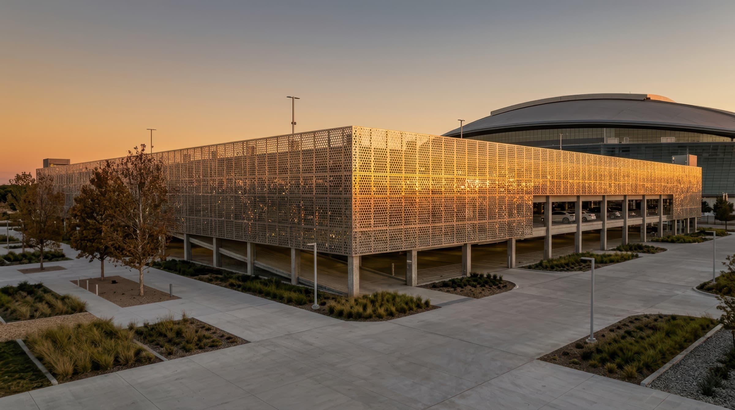 A modern structured parking facility at golden hour